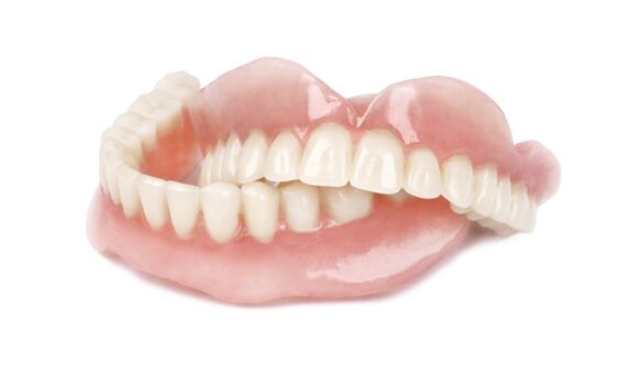 Dentures Vs Implants: Pros and Cons