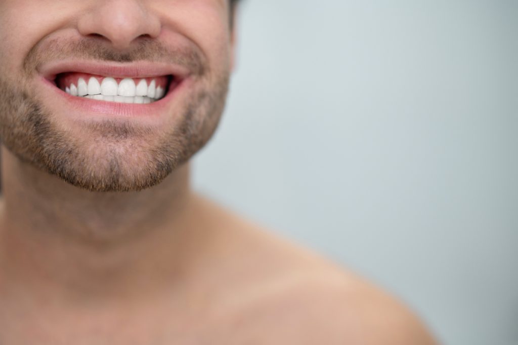 Close Up Picture Of A Man Showing His Teeth 2021 12 16 22 00 14 Utc 2 1024x681